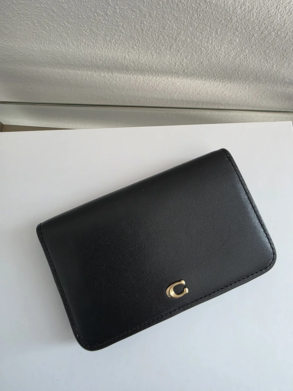 Coach Black Leather Card Case with Gold 'C' Accent